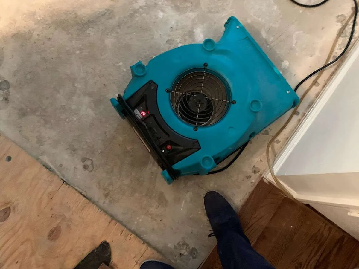 Air mover drying subfloor during Leak Detection & Repair in Rockmart